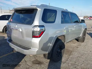 2015 Toyota 4Runner Limited with VIN JTEBU5JR6F5218586, listed as a IAAI auction lot 41594711 with 164,713 mi miles. Bid and sale history available at carsss.com. Image 4.