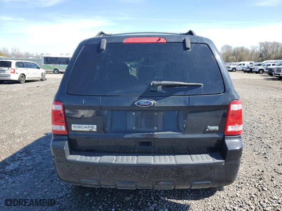 2010 Ford Escape XLT with VIN 1FMCU0DG6AKA52985, listed as a Copart auction lot 50571045 with 114,802 mi miles and Clean Title. Bid and sale history available at carsss.com. Image 6.