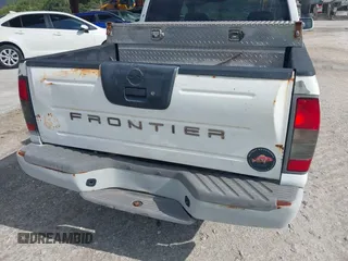2001 Nissan Frontier SE z VIN 1N6ED27T61C324671, wystawiony jako IAAI lot #42403537 z przebiegiem 190 638 mil mil oraz . Historia ofert i sprzedaży dostępna na DreamBid. Obrazek 18.