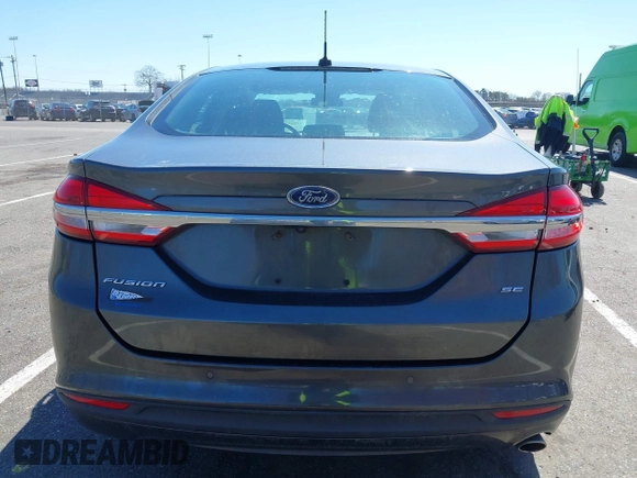 2017 Ford Fusion SE with VIN 3FA6P0H70HR107252, listed as a IAAI auction lot 42041332 with 121,255 mi miles. Bid and sale history available at carsss.com. Image 16.