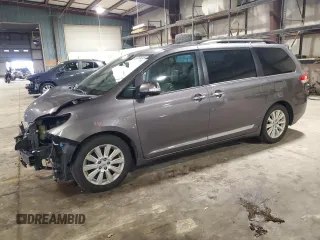 2013 Toyota Sienna XLE AAS with VIN 5TDYK3DC0DS317783, listed as a Copart auction lot 57375015 with 183,595 mi miles and Salvage title. Bid and sale history available at DreamBid. Image 1.