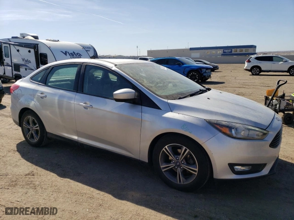 2018 Ford Focus SE with VIN 1FADP3FE5JL241561, listed as a Copart auction lot 48403005 with 67,617 mi miles and Salvage Title. Bid and sale history available at carsss.com. Image 4.