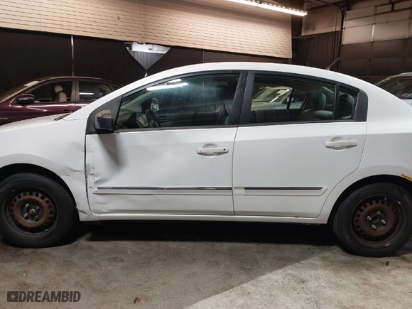 2011 Nissan Sentra 2.0 SR with VIN 3N1AB6AP7BL706114, listed as a IAAI auction lot 41822941 with 124,684 mi miles. Bid and sale history available at carsss.com. Image 14.