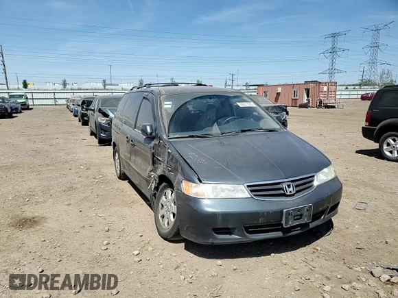 2003 Honda Odyssey EX-L z VIN 5FNRL189X3B088813, wystawiony jako Copart lot #56221685 z przebiegiem 204 443 mil mil oraz Szkoda całkowita • Salvage title. Historia ofert i sprzedaży dostępna na DreamBid. Obrazek 14.