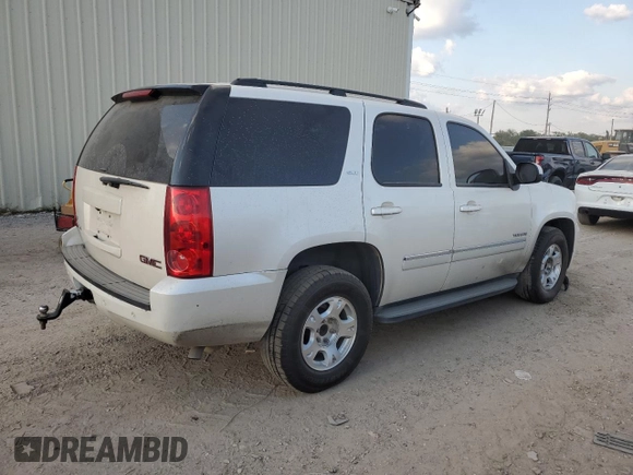 2012 GMC Yukon SLT with VIN 1GKS1CE03CR287810, listed as a Copart auction lot 73743304 with 206,122 mi miles and Salvage Title. Bid and sale history available at carsss.com. Image 3.