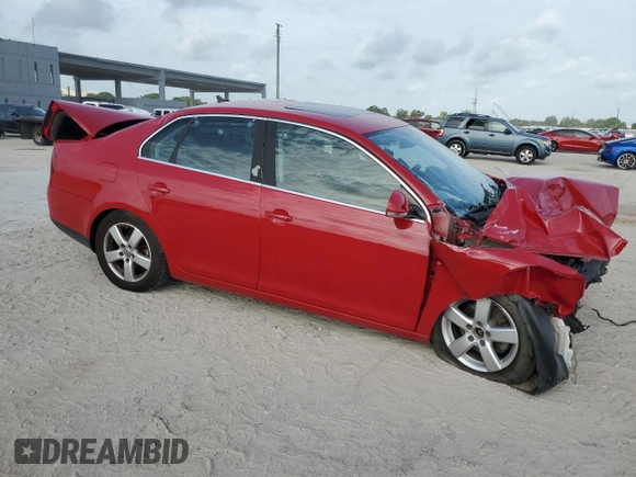 2008 Volkswagen Jetta SE with VIN 3VWRM71K18M193527, listed as a Copart auction lot 61044325 with 126,962 mi miles and Salvage title. Bid and sale history available at DreamBid. Image 4.