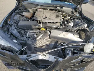 2020 Alfa Romeo Giulia z VIN ZARFANAN2L7626987, wystawiony jako Copart lot #74959044 z przebiegiem 33 486 mil mil oraz Szkoda całkowita • Salvage title. Historia ofert i sprzedaży dostępna na DreamBid. Obrazek 11.