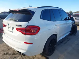 2021 BMW X3 M with VIN 5YMTS0C05M9D03595, listed as a IAAI auction lot 41324012 with 38,157 mi miles. Bid and sale history available at carsss.com. Image 4.
