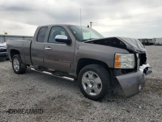 2011 Chevrolet Silverado 1500 LT with VIN 1GCRCSE0XBZ312148, listed as a Copart auction lot 51100515 with 203,183 mi miles and Salvage Title. Bid and sale history available at DreamBid. Image 4.