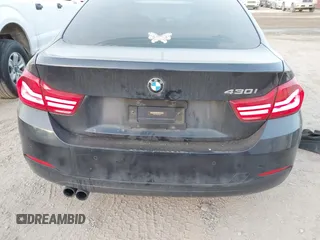 2018 BMW 4 Series 430i with VIN WBA4J1C5XJBG80412, listed as a IAAI auction lot 41788641 with 116,464 mi miles and . Bid and sale history available at carsss.com. Image 20.