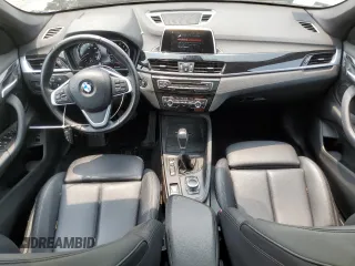 2018 BMW X1 xDrive28i with VIN WBXHT3C36J3H29952, listed as a Copart auction lot 59679285 with 75,220 mi miles and Salvage title. Bid and sale history available at DreamBid. Image 8.