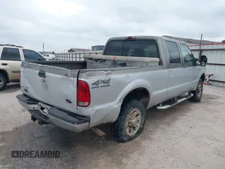 2001 Ford Super Duty F-250 XL with VIN 1FTNW21S31EC77648, listed as a IAAI auction lot 41523954 with 218,035 mi miles. Bid and sale history available at carsss.com. Image 4.