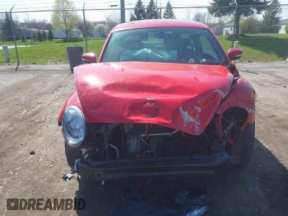 2012 Volkswagen Beetle 2.5L w/Sound/Nav PZEV with VIN 3VWJP7AT6CM620285, listed as a IAAI auction lot 42094101 with 125,737 mi miles and . Bid and sale history available at DreamBid. Image 12.