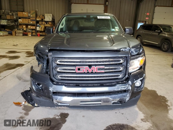 2015 GMC Canyon 4WD SLE with VIN 1GTG6BE37F1118335, listed as a Copart auction lot 85271264 with 58,679 mi miles and Salvage Title. Bid and sale history available at carsss.com. Image 5.