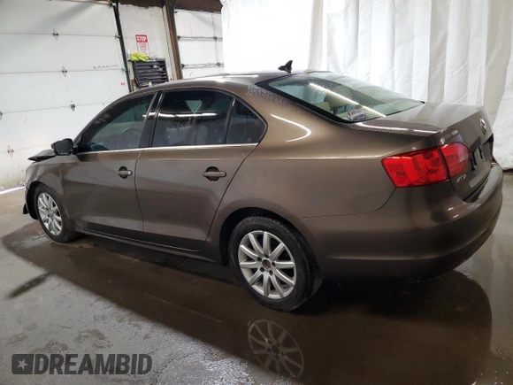 2013 Volkswagen Jetta TDI w/Premium with VIN 3VW3L7AJ2DM374825, listed as a Copart auction lot 62754875 with 152,278 mi miles and Salvage title. Bid and sale history available at DreamBid. Image 2.