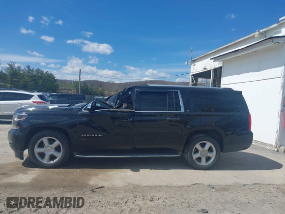 2015 Chevrolet Suburban LTZ with VIN 1GNSKKKC9FR280390, listed as a IAAI auction lot 41882449 with 80,499 mi miles and . Bid and sale history available at DreamBid. Image 14.