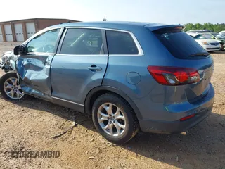 2014 Mazda CX-9 Touring with VIN JM3TB3CV7E0435659, listed as a IAAI auction lot 42428247 with 124,523 mi miles and . Bid and sale history available at DreamBid. Image 3.