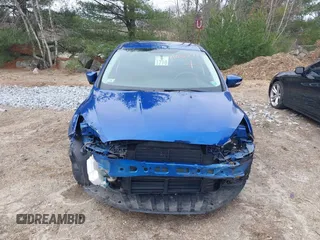 2018 Ford Focus SE z VIN 1FADP3F25JL255840, wystawiony jako IAAI lot #41852913 z przebiegiem 64 010 mil mil oraz . Historia ofert i sprzedaży dostępna na DreamBid. Obrazek 12.