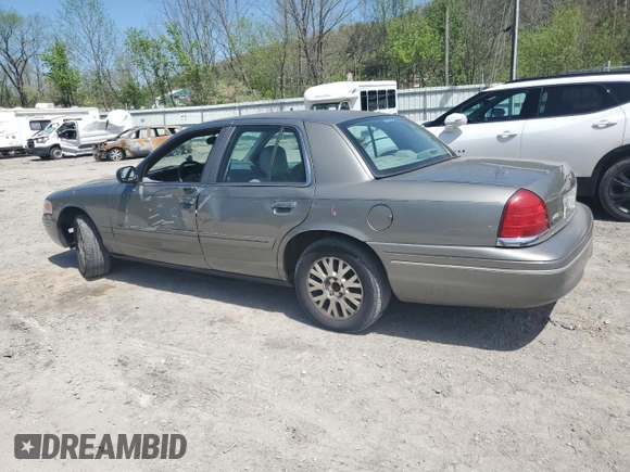 2004 Ford Crown Victoria LX z VIN 2FAFP74W14X130606, wystawiony jako Copart lot #54120085 z przebiegiem 221 700 mil mil oraz Szkody całkowita. Historia ofert i sprzedaży dostępna na DreamBid. Obrazek 2.