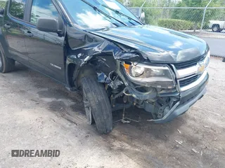 2018 Chevrolet Colorado 4WD Work Truck z VIN 1GCGTBEN9J1206595, wystawiony jako IAAI lot #42150736 z przebiegiem 176 880 mil mil oraz . Historia ofert i sprzedaży dostępna na DreamBid. Obrazek 6.
