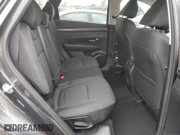 2023 Hyundai Tucson SEL with VIN 5NMJBCAE5PH186784, listed as a Copart auction lot 62896985 with 13,633 mi miles and Salvage title. Bid and sale history available at DreamBid. Image 11.