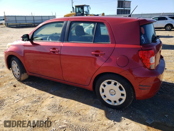 2012 Scion xD with VIN JTKKU4B45C1025911, listed as a Copart auction lot 84477054 with 102,953 mi miles and Salvage Title. Bid and sale history available at DreamBid. Image 2.