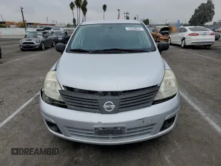 2009 Nissan Versa 1.6 with VIN 3N1CC11E79L429613, listed as a Copart auction lot 72220034 with 134,891 mi miles and Salvage Title. Bid and sale history available at carsss.com. Image 5.
