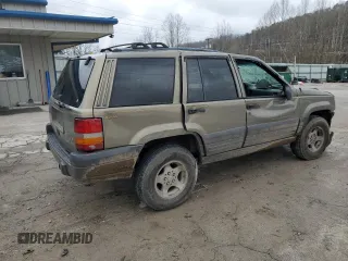 1996 Jeep Grand Cherokee Laredo with VIN 1J4GZ58Y5TC378100, listed as a Copart auction lot 85493724 with 0 mi miles and Salvage Title. Bid and sale history available at carsss.com. Image 3.