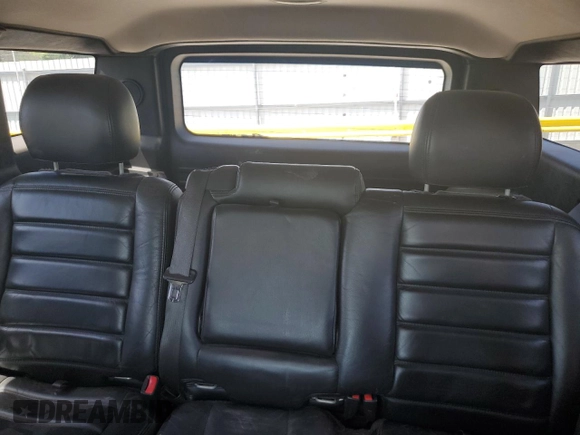 2007 Hummer H2 SUV z VIN 5GRGN23UX7H101776, wystawiony jako Copart lot #56337975 z przebiegiem 176 599 mil mil oraz Szkoda całkowita • Salvage title. Historia ofert i sprzedaży dostępna na DreamBid. Obrazek 10.