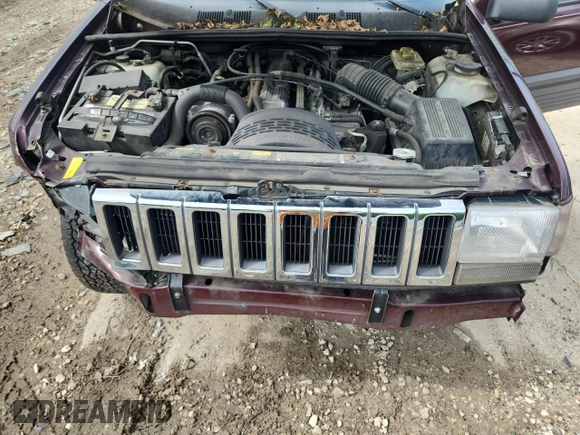 1994 Jeep Grand Cherokee Laredo z VIN 1J4GZ58S0RC221854, wystawiony jako Copart lot #61950825 z przebiegiem 69 465 mil mil oraz Czysty tytuł • Clean title. Historia ofert i sprzedaży dostępna na DreamBid. Obrazek 12.
