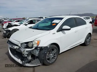 2013 Chevrolet Sonic LS with VIN 1G1JA5SH9D4249356, listed as a IAAI auction lot 42373352 with 151,337 mi miles and . Bid and sale history available at DreamBid. Image 6.