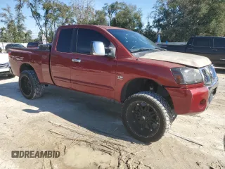 2004 Nissan Titan SE with VIN 1N6AA06A74N508277, listed as a Copart auction lot 87801695 with 124,137 mi miles and Clean Title. Bid and sale history available at carsss.com. Image 4.
