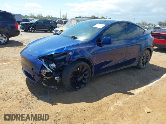 2020 Tesla Model Y Long Range with VIN 5YJYGDEF4LF000494, listed as a IAAI auction lot 41894856 with 118,638 mi miles and . Bid and sale history available at DreamBid. Image 2.