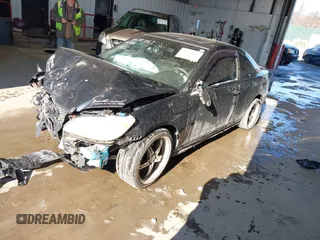 2005 Honda Civic EX with VIN 1HGEM21945L007964, listed as a IAAI auction lot 41393867 with 200,000 mi miles. Bid and sale history available at carsss.com. Image 2.