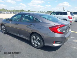 2020 Honda Civic LX with VIN 19XFC2F68LE007735, listed as a IAAI auction lot 42215294 with 3,849 mi miles and . Bid and sale history available at DreamBid. Image 3.