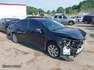 2021 Toyota Corolla LE with VIN JTDEPMAE8MJ164857, listed as a IAAI auction lot 39669931 with 63,523 mi miles. Bid and sale history available at carsss.com. Image 1.