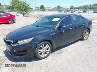 2012 Kia Optima EX with VIN 5XXGN4A70CG042190, listed as a IAAI auction lot 42003619 with 189,622 mi miles. Bid and sale history available at carsss.com. Image 2.