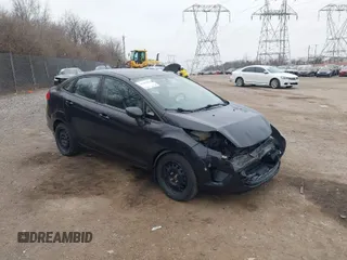 2012 Ford Fiesta S with VIN 3FADP4AJ8CM145208, listed as a IAAI auction lot 41784292 with 99,167 mi miles. Bid and sale history available at carsss.com. Image 1.