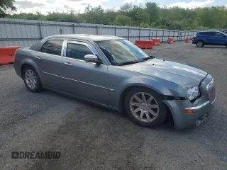 2006 Chrysler 300 C z VIN 2C3LA63HX6H439925, wystawiony jako Copart lot #56059655 z przebiegiem 206 856 mil mil oraz Czysty tytuł • Clean title. Historia ofert i sprzedaży dostępna na DreamBid. Obrazek 4.