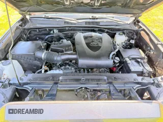 2021 Toyota Tacoma SR с VIN 3TMCZ5AN3MM441215, выставлен на аукционе Copart как лот 64744385 с пробегом 30 503 миль миль и Списание • Salvage title. История ставок и продаж доступна на DreamBid. Изображение 7.