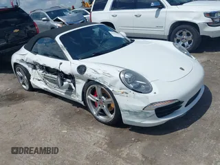 2014 Porsche 911 Carrera S z VIN WP0CB2A97ES154099, wystawiony jako IAAI lot #42264557 z przebiegiem 89 991 mil mil oraz . Historia ofert i sprzedaży dostępna na DreamBid. Obrazek 1.