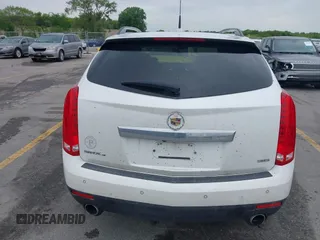 2013 Cadillac SRX Performance Collection z VIN 3GYFNHE35DS569528, wystawiony jako IAAI lot #42329652 z przebiegiem 97 184 mil mil oraz . Historia ofert i sprzedaży dostępna na DreamBid. Obrazek 16.