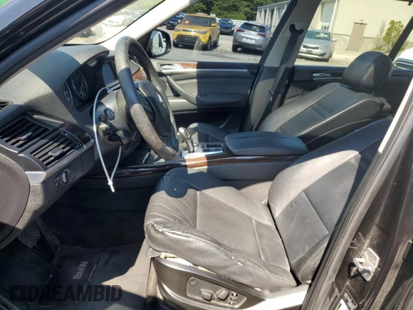 2012 BMW X5 35i with VIN 5UXZV4C54CL752079, listed as a Copart auction lot 62147515 with 147,244 mi miles and Clean title. Bid and sale history available at DreamBid. Image 7.