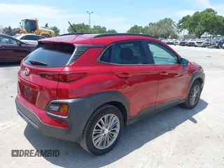 2021 Hyundai Kona SEL with VIN KM8K22AA8MU601480, listed as a IAAI auction lot 39589701 with 55,876 mi miles and . Bid and sale history available at carsss.com. Image 4.