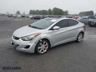 2013 Hyundai Elantra GLS PZEV with VIN KMHDH4AE9DU499015, listed as a IAAI auction lot 41938352 with 243,771 mi miles. Bid and sale history available at carsss.com. Image 2.