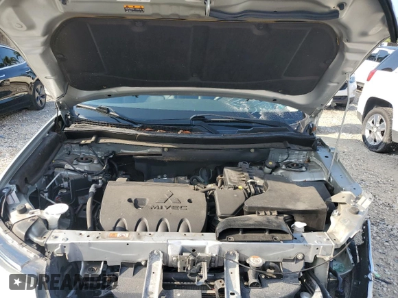 2020 Mitsubishi Outlander SE z VIN JA4AD3A36LZ028270, wystawiony jako Copart lot #58084565 z przebiegiem 49 111 mil mil oraz Szkoda całkowita • Salvage title. Historia ofert i sprzedaży dostępna na DreamBid. Obrazek 12.