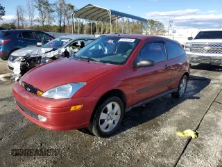 2001 Ford Focus ZX3 with VIN 3FAHP313X1R219211, listed as a Copart auction lot 81525164 with 214,114 mi miles and Salvage title. Bid and sale history available at DreamBid. Image 1.