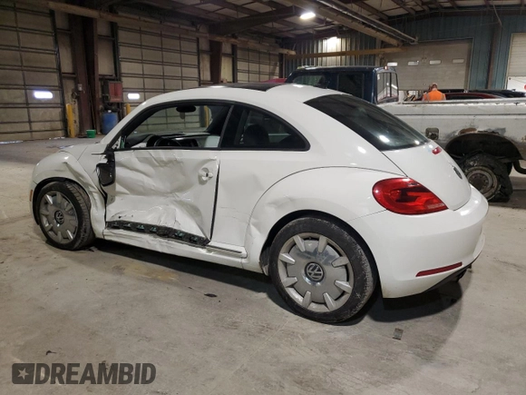 2012 Volkswagen Beetle 2.5L PZEV with VIN 3VWJP7AT3CM610930, listed as a Copart auction lot 79702664 with 0 mi miles and Salvage Title. Bid and sale history available at carsss.com. Image 2.