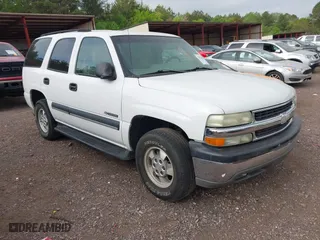2003 Chevrolet Tahoe LT with VIN 1GNEC13Z13J230763, listed as a IAAI auction lot 42028002 with 201,448 mi miles. Bid and sale history available at carsss.com. Image 1.