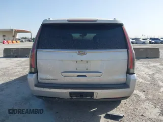2016 Cadillac Escalade Luxury Collection z VIN 1GYS4BKJ7GR315425, wystawiony jako IAAI lot #41835277 z przebiegiem 176 753 mil mil oraz . Historia ofert i sprzedaży dostępna na DreamBid. Obrazek 16.